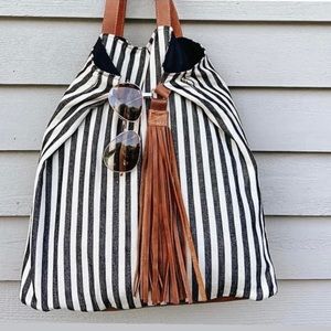 Gently used Noonday tote